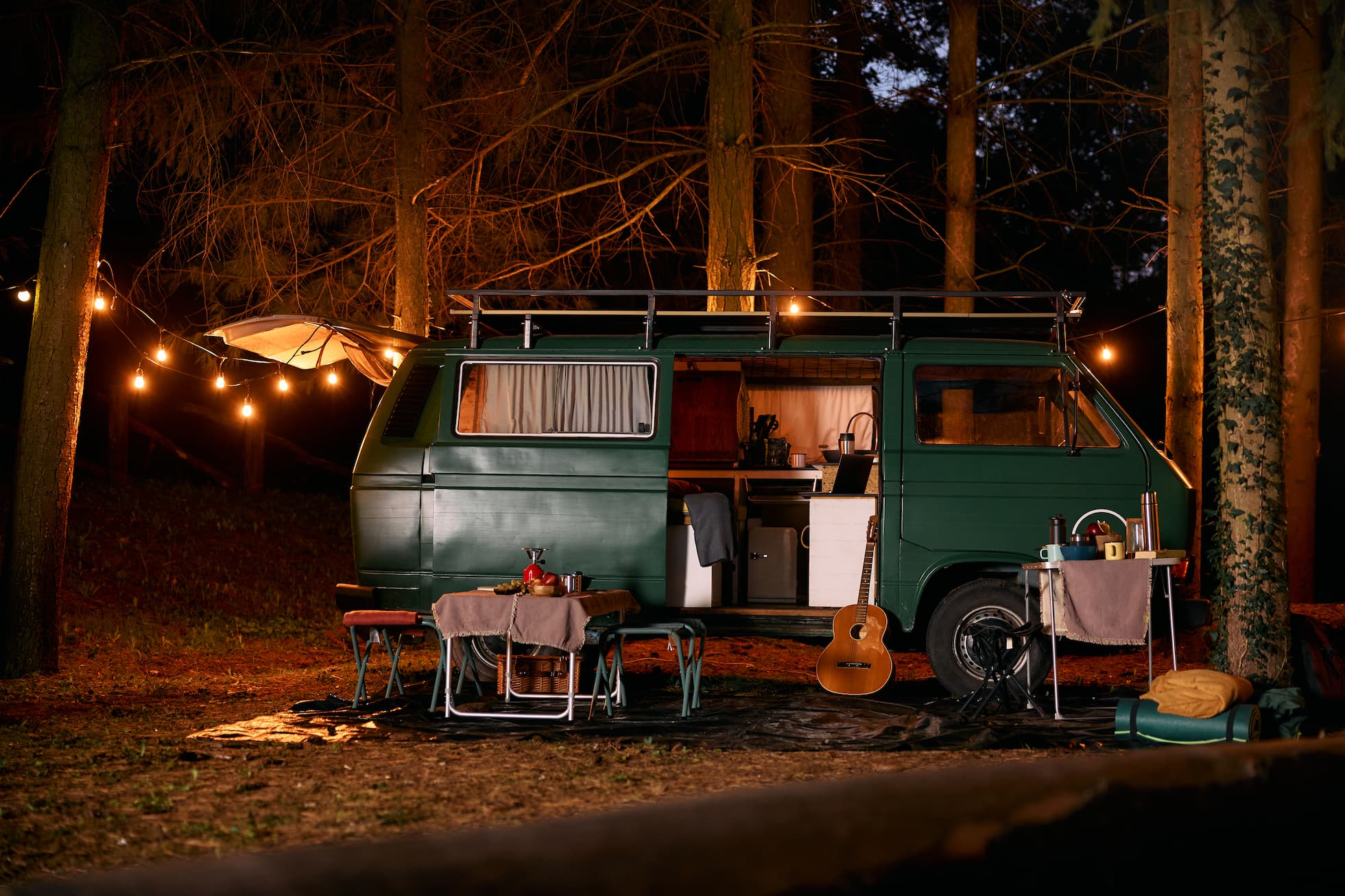 camper-trailer-in-the-woods-at-night-2024-12-13-18-17-41-utc (1)